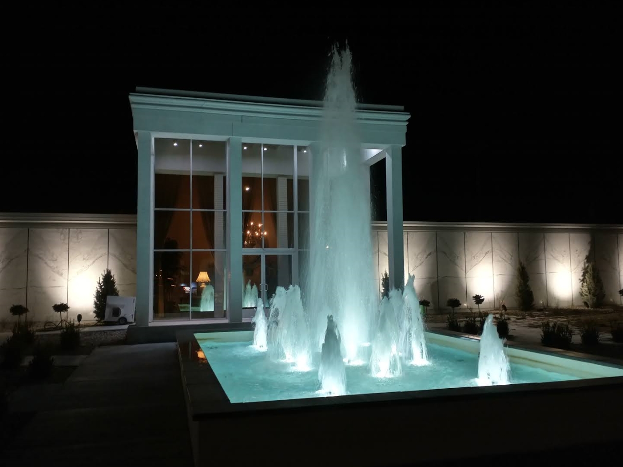 Colorful outdoor fountain shaped like glass flowers