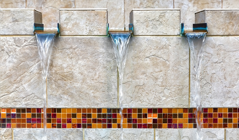 Modern,fountain,detail.,waterfall,drop,design,with,decorative,glass,mosaic